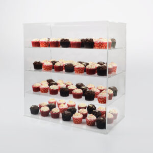 A cake display cabinet with four shelves holding a selection of cupcakes.