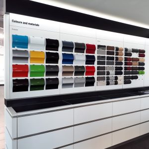 A car showroom colour and material display.