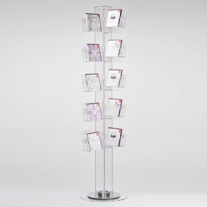 A greeting card spinner made from clear acrylic with cards on display.