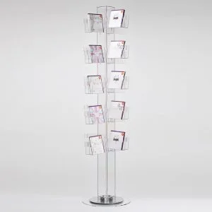 A greeting card spinner made from clear acrylic with cards on display.