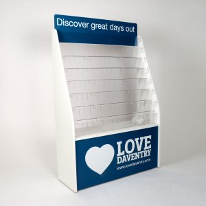 A wood finish floor standing brochure display with custom printing and tiered shelving.