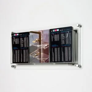 A wall mounted brochure holder with brochures on display.