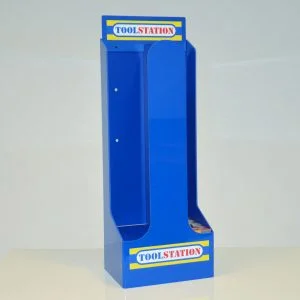 A blue custom made double dump bin with "tool station" printed on the top and bottom.
