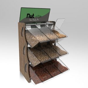 A wall mounted packaging free pick and mix dispenser with dried foods inside.