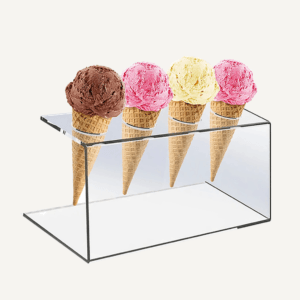 A clear acrylic ice cream holder holding 4 ice creams.