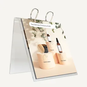 A clear acrylic ring binder holding informational pages of skincare products.