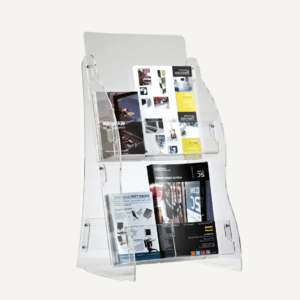 A clear acrylic brochure stand with two shelves and different brochures on display.