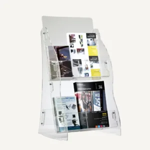 A clear acrylic brochure stand with two shelves and different brochures on display.