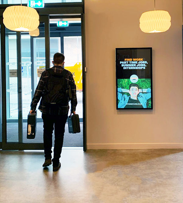 An Ultra Thin Digital Advertising Screen in a hallway.