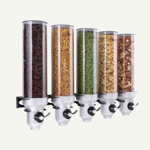 A wall mounted five container dry food dispenser with different nuts and pulses inside.