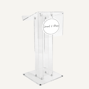 Clear acrylic podium with customisable front panel reading 'Laurel & Daisy'.