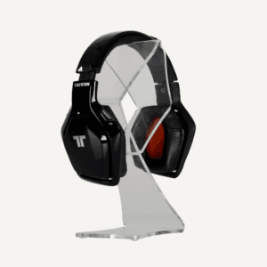 A clear acrylic headphone stand with headphones on display.