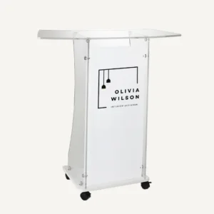 White corporate lectern with black castor wheels, with "olivia wilson interior designer" logo on the front.