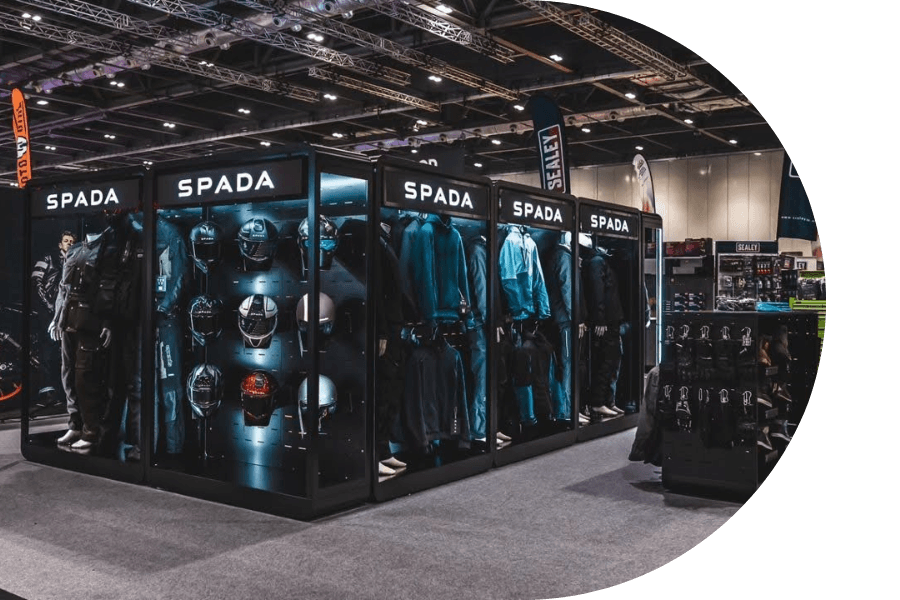 Clothing display in exhibition setting.