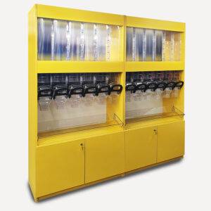 A yellow floor standing pick n mix unit with with lots of sweet dispensers and lockable cupboard doors.