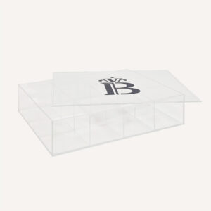 A Custom Acrylic Storage Box laid flat with is lid off, and a banana split logo on the front.