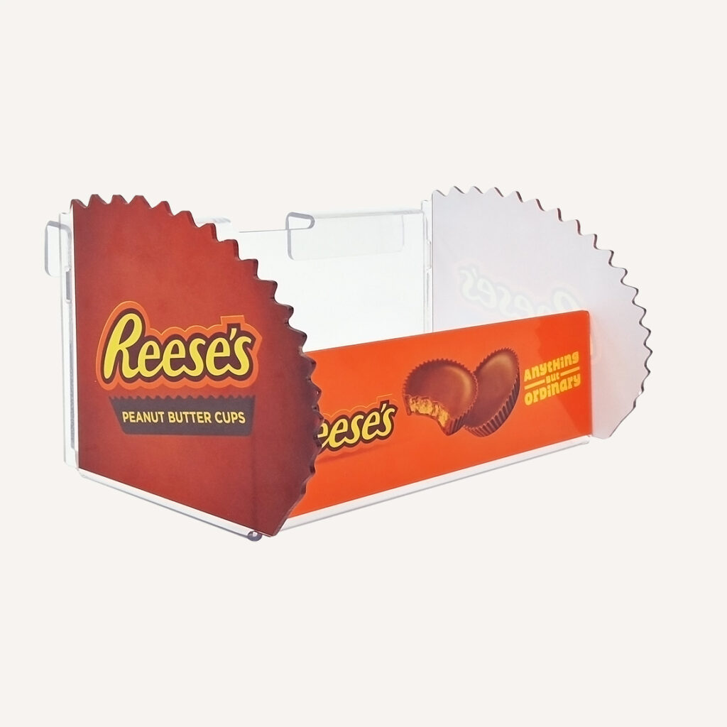 A side view of a Reese's peanut butter cup retail product display.