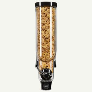 A front facing view of a bulk dry food dispenser with dried banana chips inside.