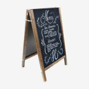 An A-Board chalkboard with a straight top with hand drawn specials menu in white chalk.