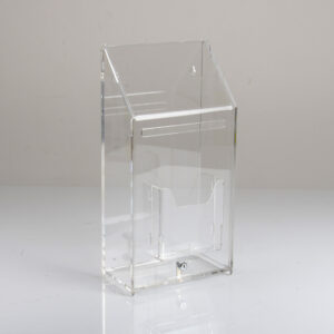 A clear acrylic ballot box.
