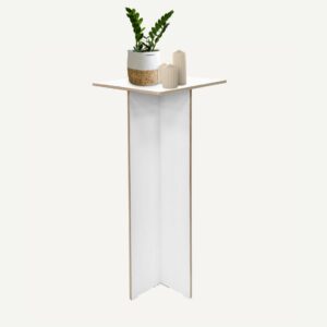 White Plywood Pedestal with Plant and candles on display.