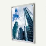 A clear acrylic frame with a skyscraper print inside.