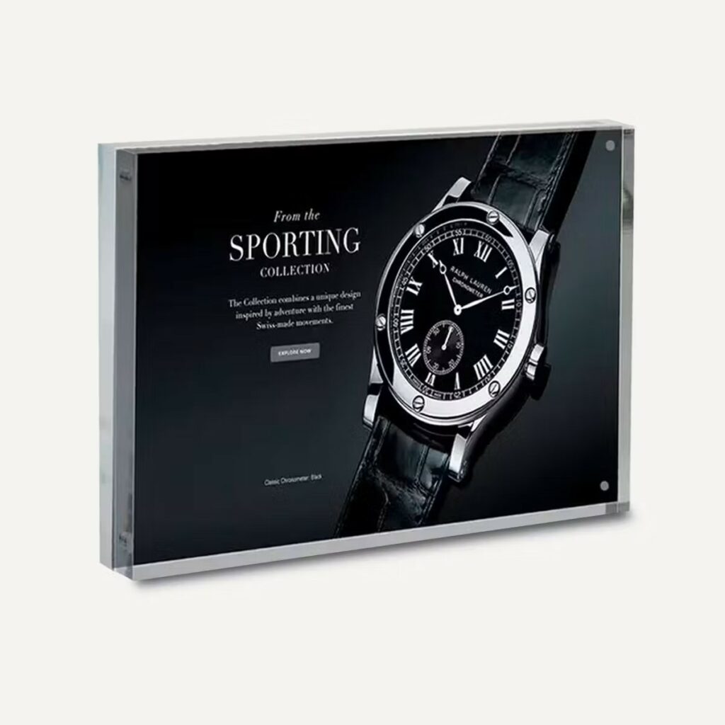 A framed photo block advertising a watch.