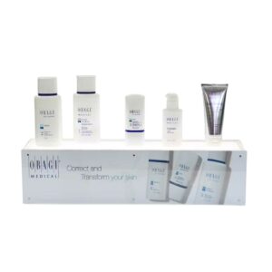 A custom, illuminated countertop display holding different skincare products.