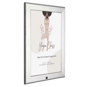 A silver snap frame with print.