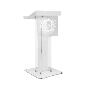 A clear and white acrylic lectern with an etched illuminated logo.