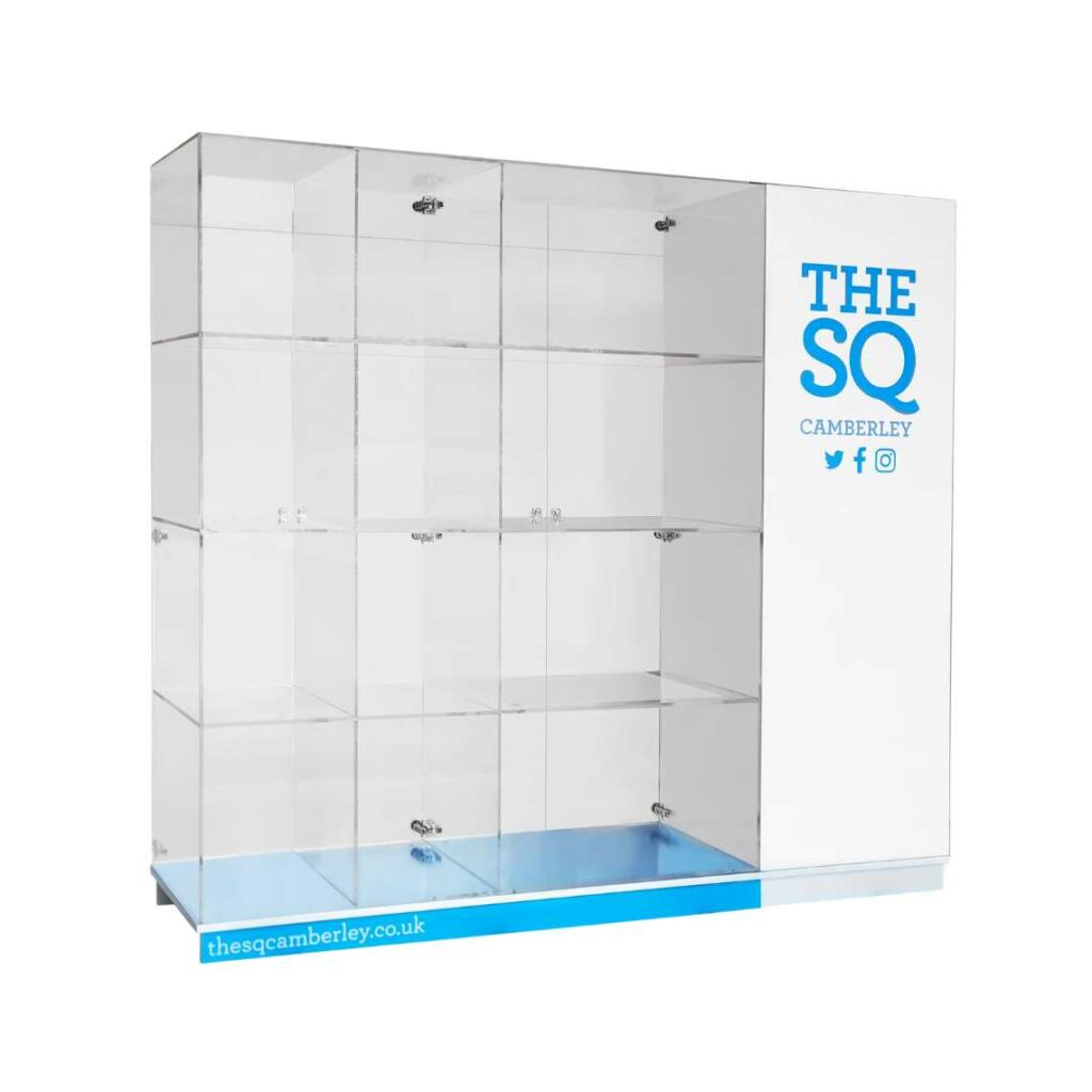 A custom clear acrylic cabinet with SQ colours and graphics.