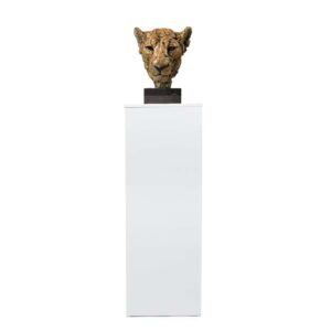 A white flat pack plinth with a sculpture on top.