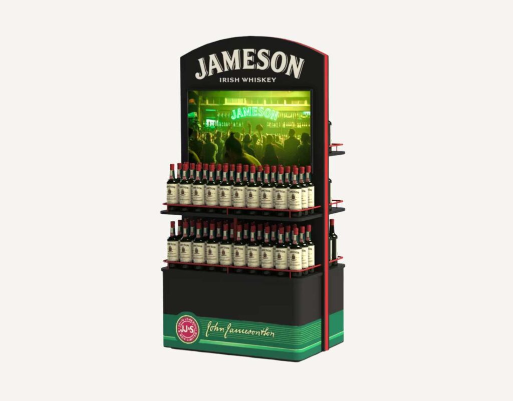 A pos display stand with a digital screen and Jameson drinks products on display.