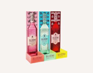 A custom acrylic bottle glorifier with magnetic traps.